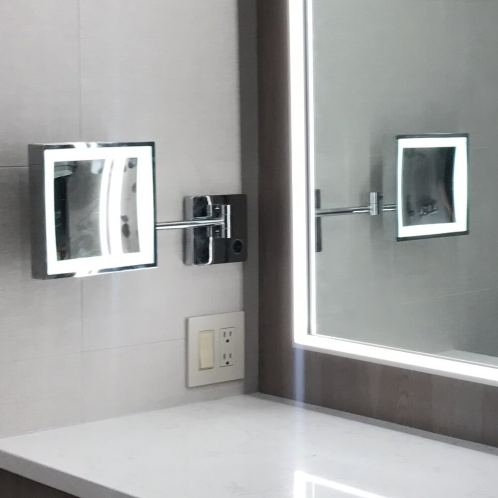 Magnified Make Up Mirror with LED Frame & articulated arm. For wall mounting.
